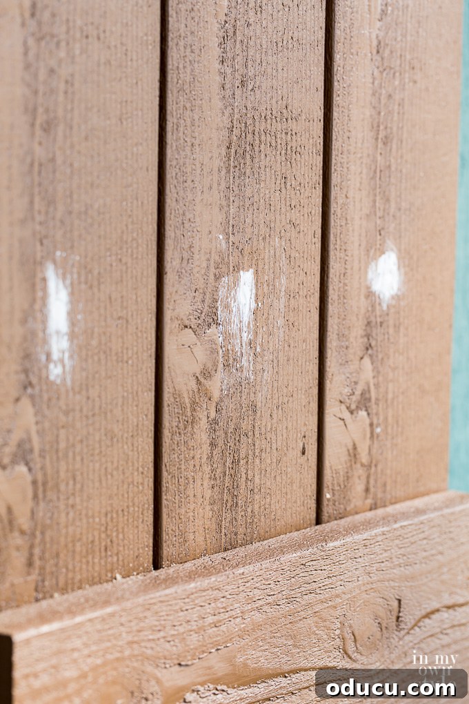 Elevate Your Curb Appeal Nu-Wood Exterior Makeover 17 Filling screw holes in Nu-Wood shutters with exterior spackle