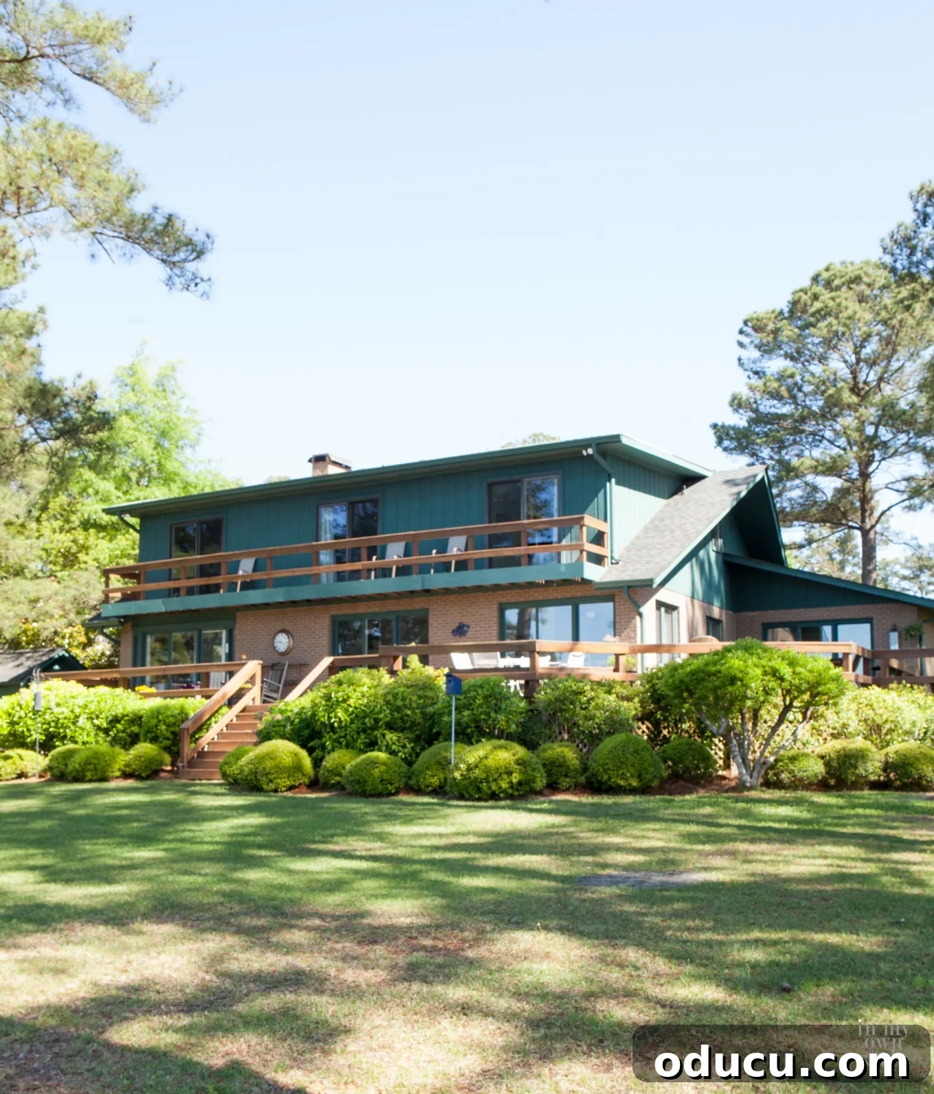 Elevate Your Curb Appeal Nu-Wood Exterior Makeover 4 Exterior house color scheme featuring beige and dark teal/green