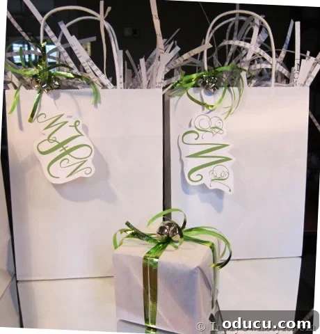 Festive Folds and Finishing Touches 3 Monogrammed gift bags with custom tags, showcasing a personalized touch for holiday gifts