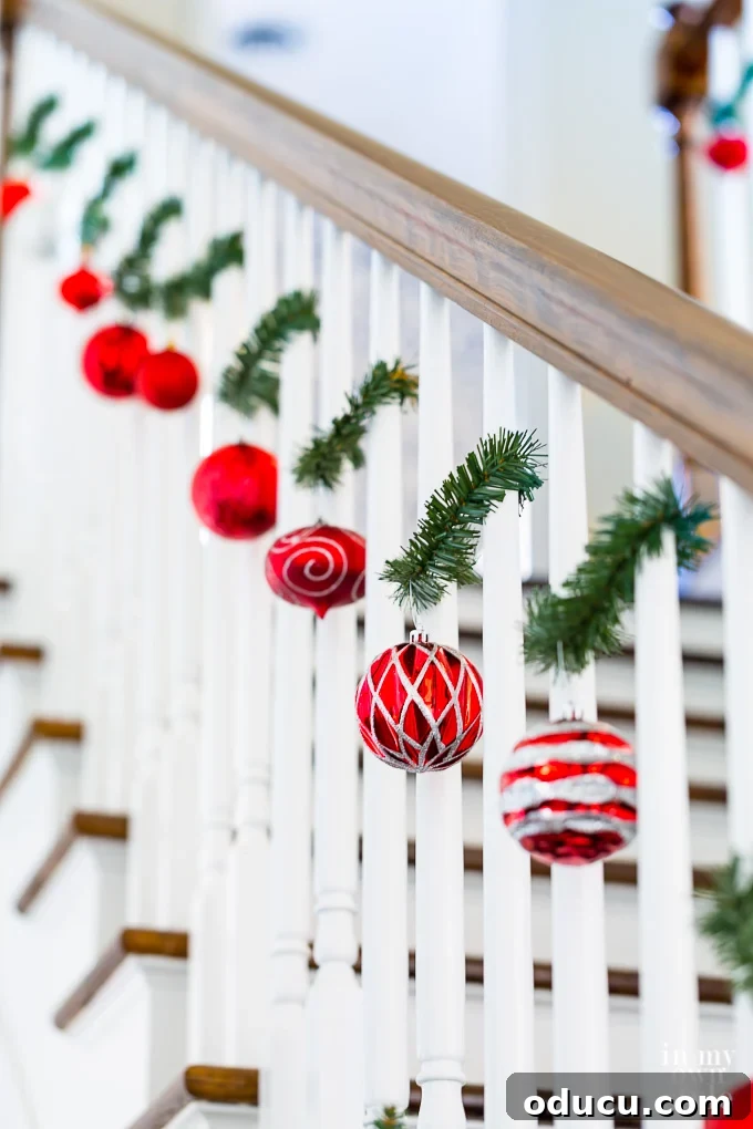 Christmas Staircase Decorating Idea using Garland Ties-