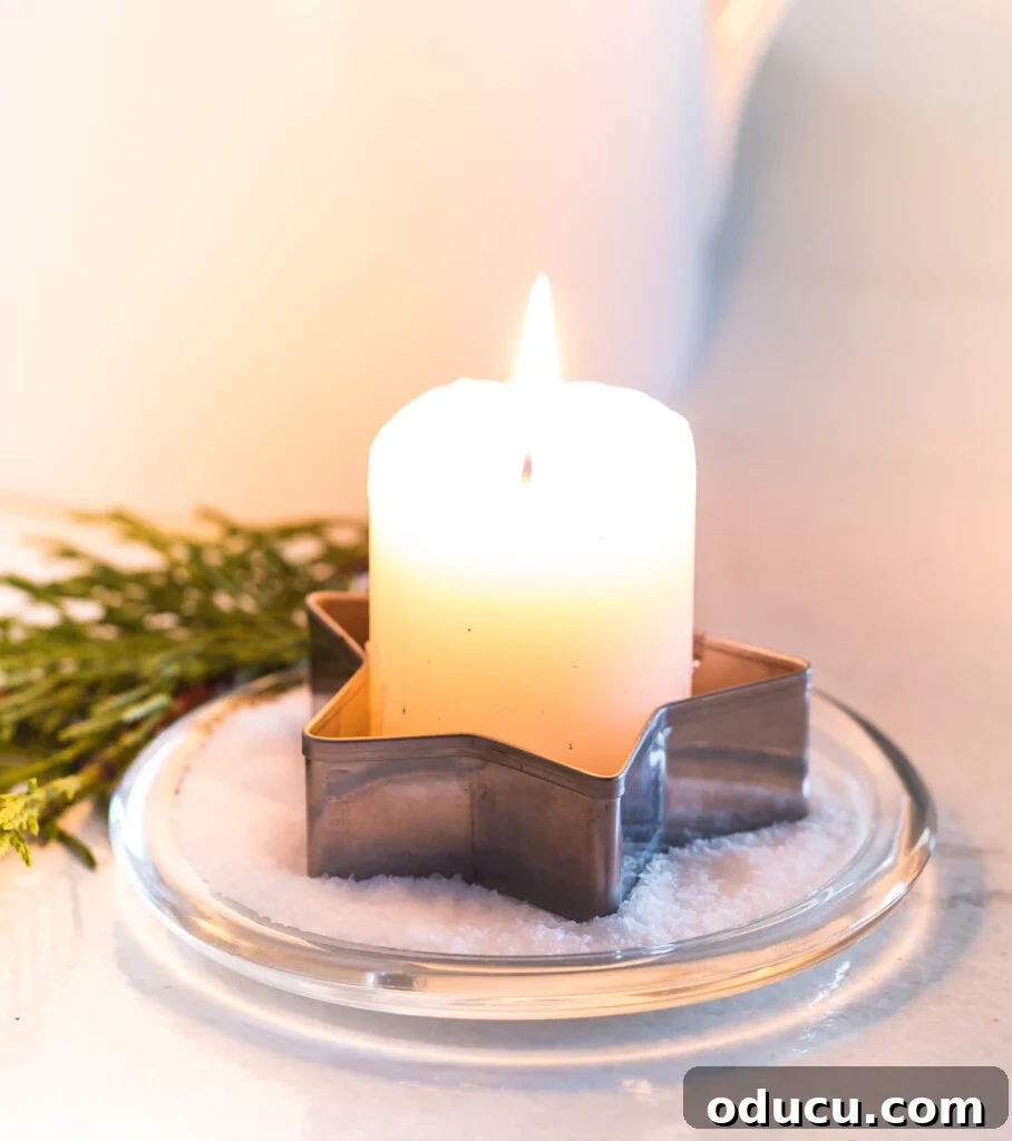 Star shaped cookie cutter used as a votive candle holder for Christmas