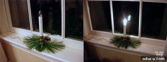 Christmas decorating candles in each window