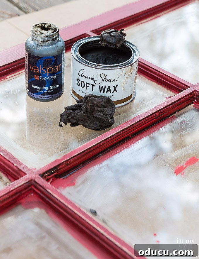 Frosted Window Mantelscape 13 Holiday Mantel Decorating Idea that shows how to repurpose a window sash and turn it into mantel decor.