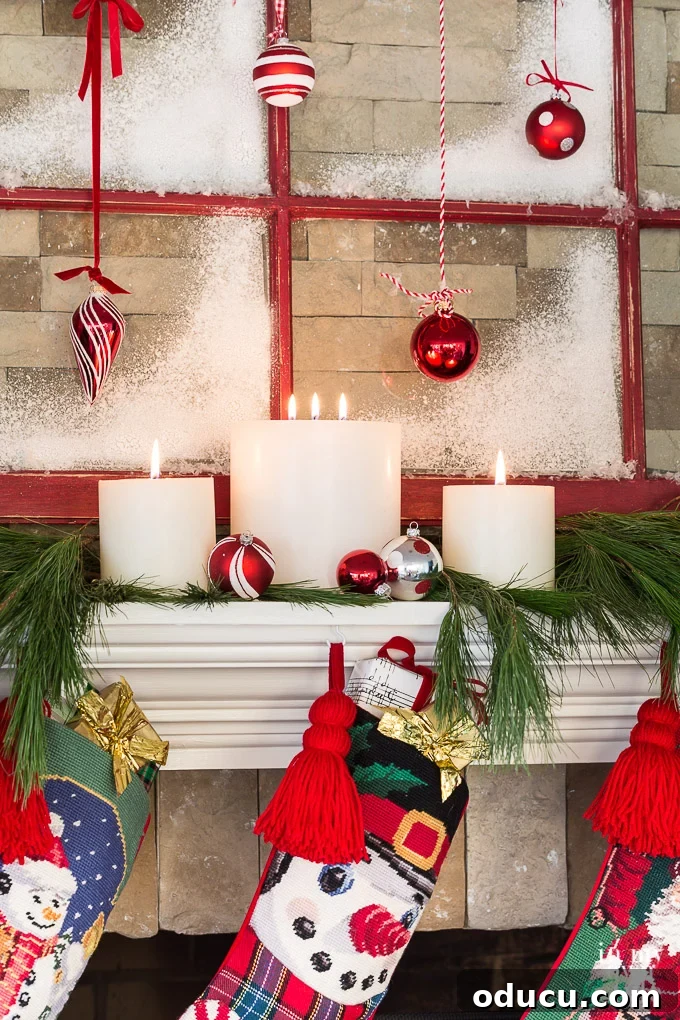 Frosted Window Mantelscape 15 Pottery Barn pillar candles on a Christmas mantel