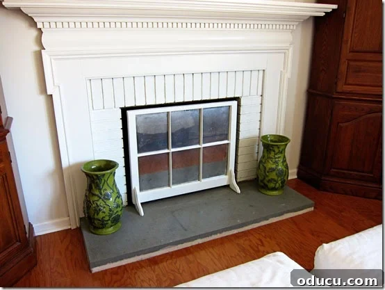 Firepalce-Screen-Completed- Completed fireplace screen with subtle mirror effect.