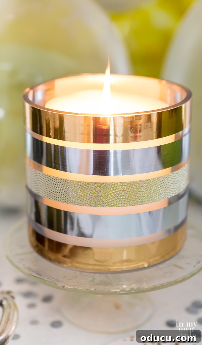 Quirky New Year Fun with Duck Mirrors and Texture Tape 8 DIY Metallic candle holder created with Duck Tape, serving as festive decor for a New Year's Eve party