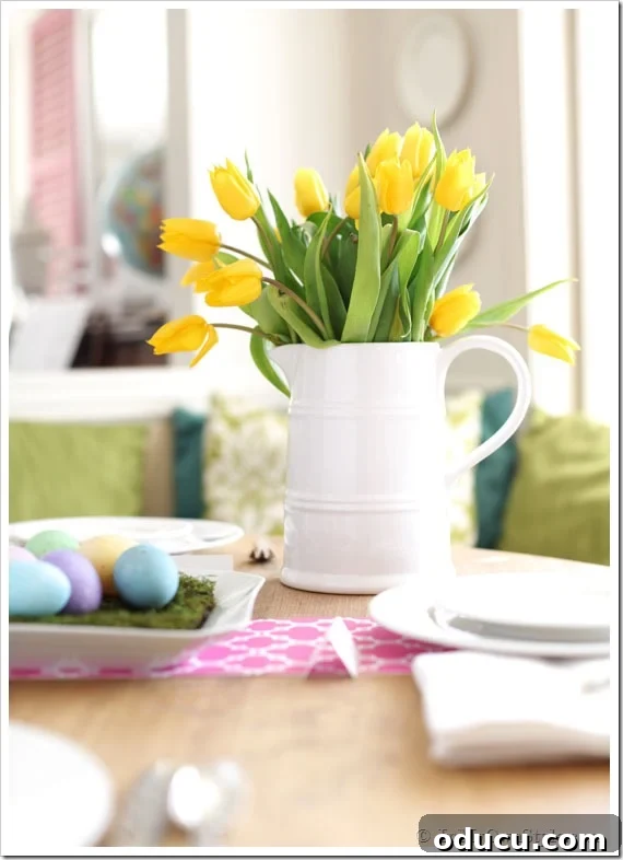 Curating Your Home Decor Capsule 12 A versatile white pitcher used as a vase, embodying the essence of capsule decorating for home decor.