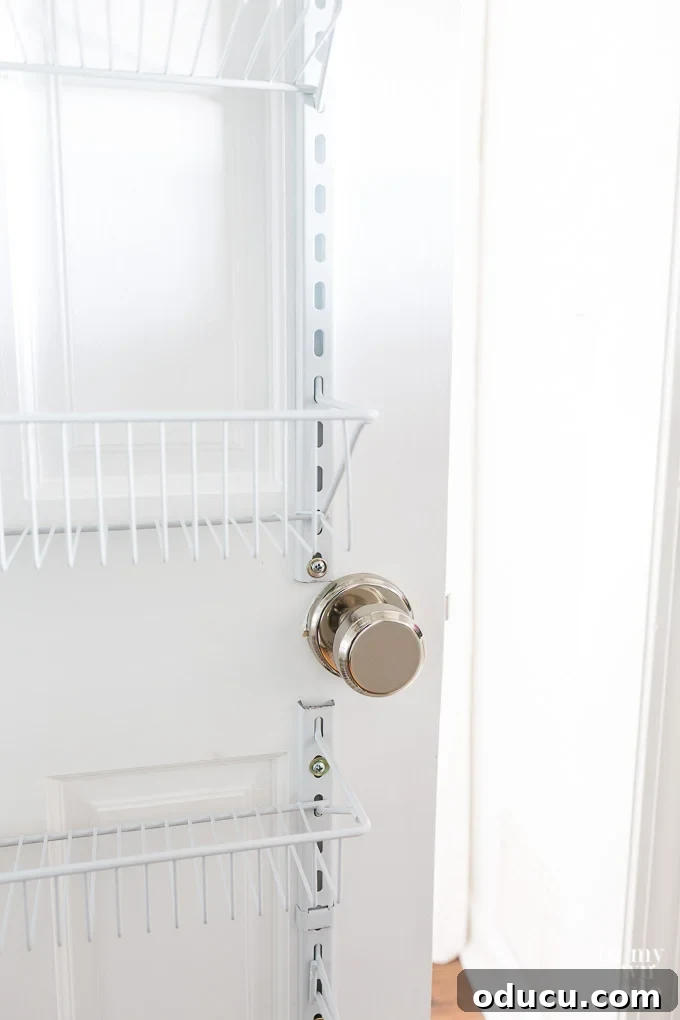 Pantry Closet Transformation 11 Detailed view of the wire door rack modification around the doorknob