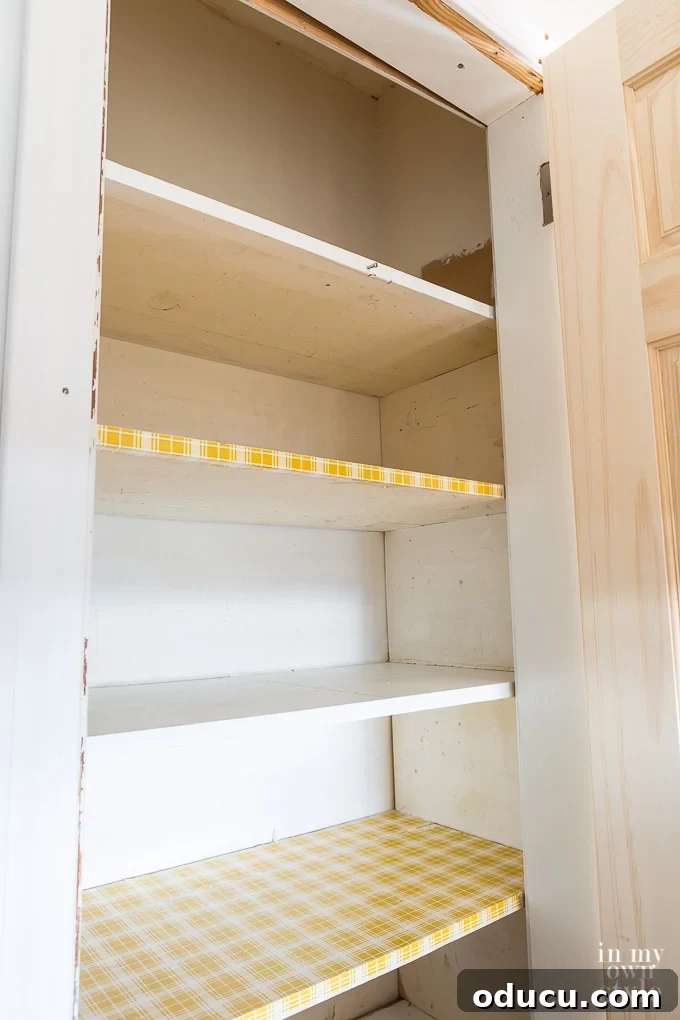 Pantry Closet Transformation 6 A view inside the pantry closet, showing the width difference between the door opening and the interior walls