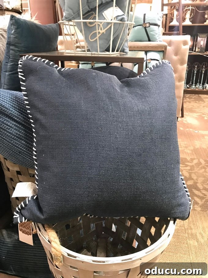 Turn Cloth Napkins into Unique Throw Pillow Covers 9 A decorative pillow showcasing a whipstitched edge, illustrating an alternative hand-stitching technique for DIY pillow covers.