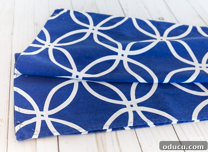 Turn Cloth Napkins into Unique Throw Pillow Covers 11 two folded cloth napkins