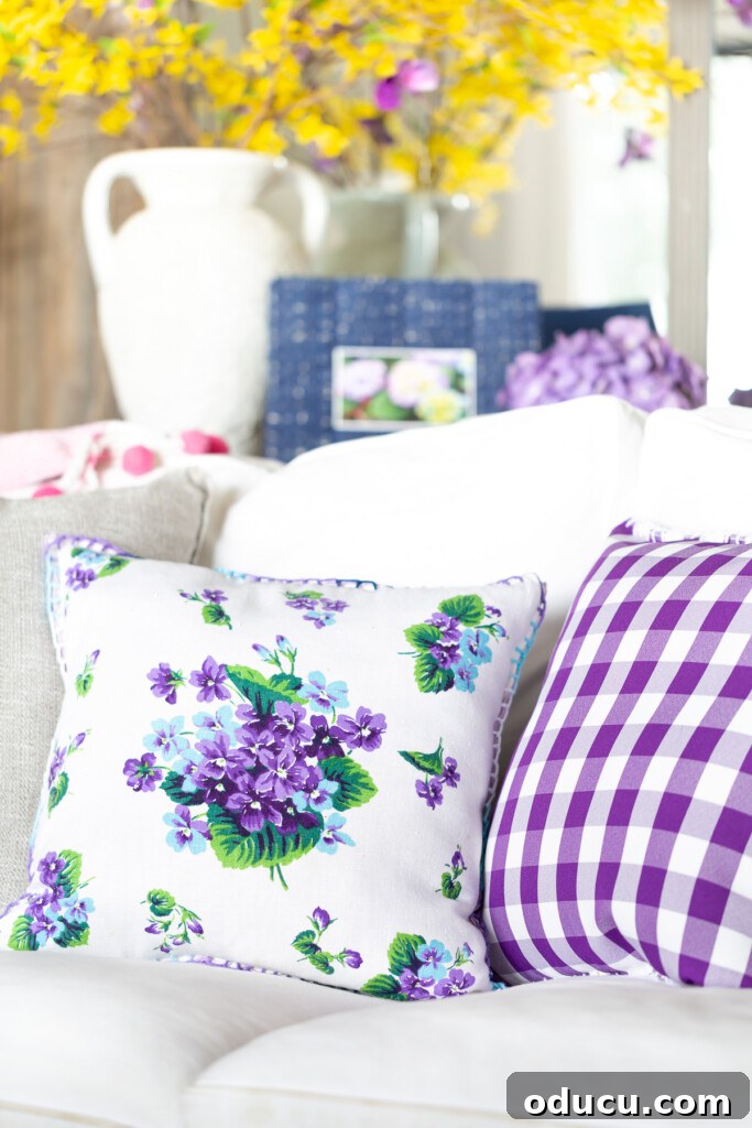 Turn Cloth Napkins into Unique Throw Pillow Covers 3 Beautiful throw pillow covers made from repurposed vintage floral linen napkins, showcasing a sustainable home decor idea.
