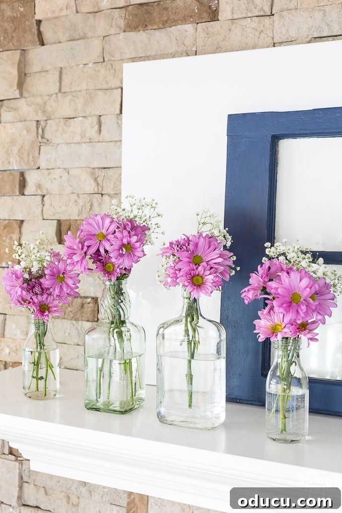 Upcycled Blooms: Spring Mantel Decor 3 Budget-friendly Spring mantel decorating ideas using repurposed and recycled items