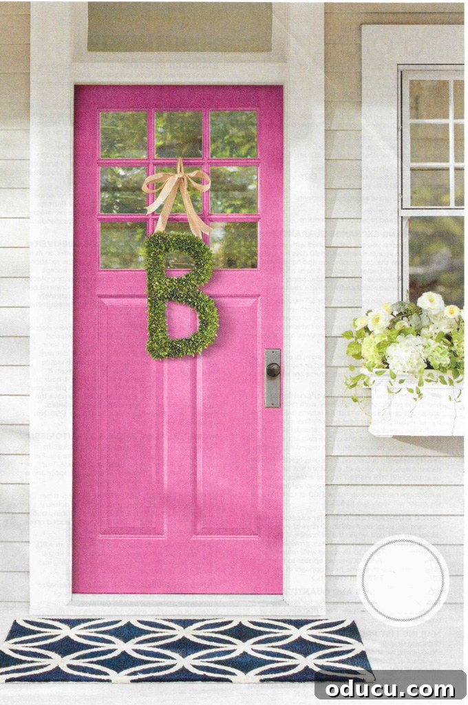 Effortless Spring Coffee Table Tray Decor 2 Grandin Road catalog pink door and boxwood initial wreath, inspiring spring decor colors.