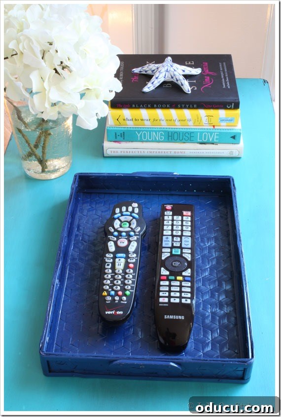 Effortless Spring Coffee Table Tray Decor 11 How to spray paint a thrift store tray to transform it into a chic decorative accessory for organizing remotes.