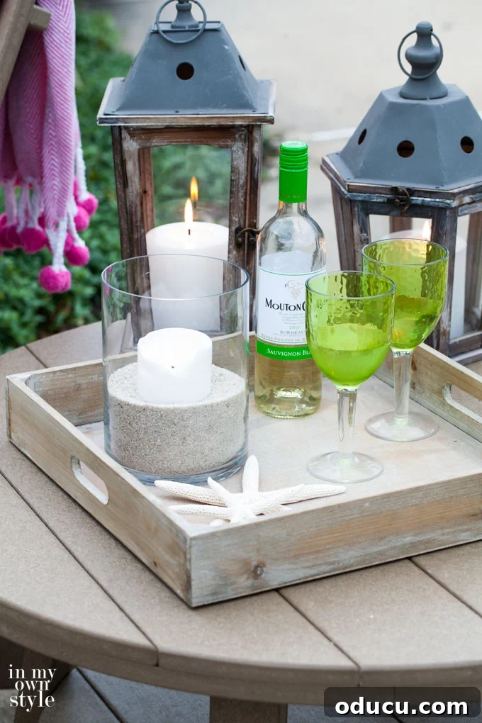 Effortless Spring Coffee Table Tray Decor 12 Driftwood finish outdoor furniture with tray on top, perfect for outdoor entertaining.