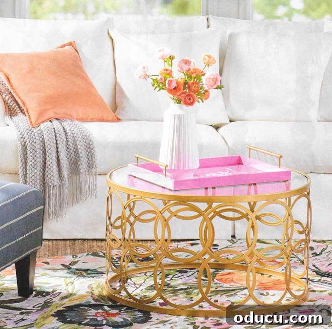 Effortless Spring Coffee Table Tray Decor 3 Grandin Road catalog table with a pink tray, providing styling inspiration.