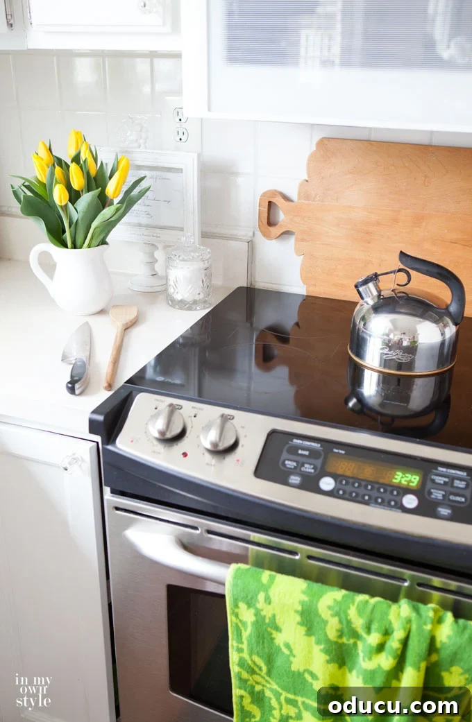 Mastering Faux Florals: Top 12 Decorating Secrets 2 Yellow tulips on Kitchen decorating with wood bread boards.