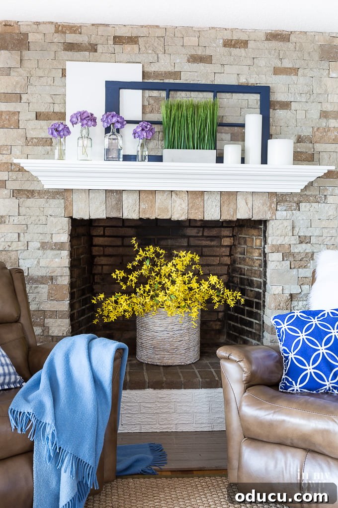 Mastering Faux Florals: Top 12 Decorating Secrets 5 Fake flower decorating tips showing fake forsythia in fireplace box
