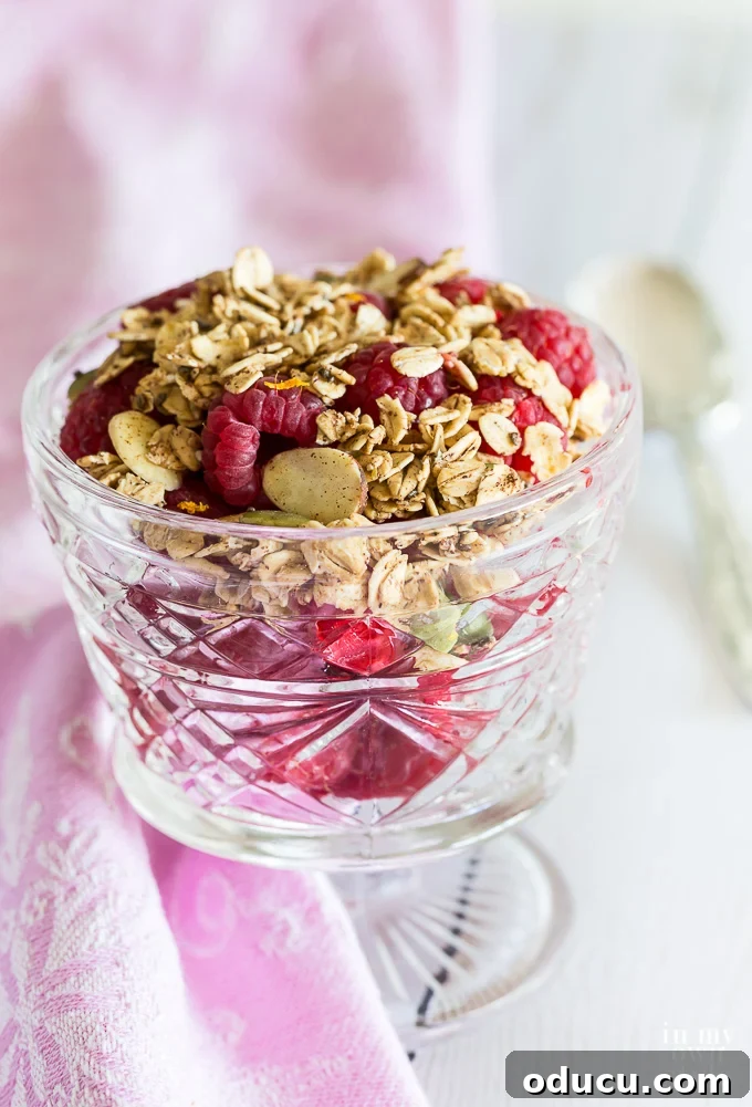 Light and Crunchy Fat-Free Granola 5 Weight Watchers Freestyle Non-Fat Granola Recipe in a glass pedestal dessert bowl.