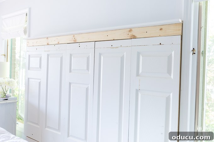 Detailed tutorial on how to make a headboard using old doors