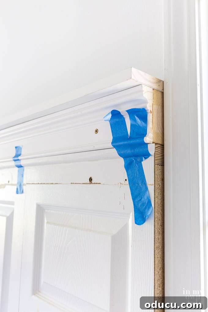 Comprehensive step-by-step photo tutorial on making a headboard using old doors and wood molding