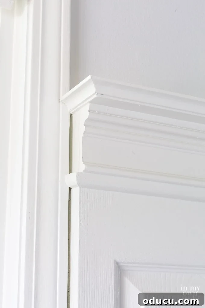 Guide on how to make a large headboard to fit between two windows using old doors