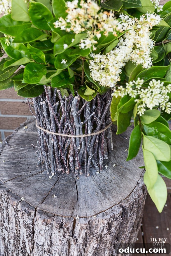 Handcraft a Rustic Twig Vase 2 how to make an easy DIY rustic twig vase to showcase your favorite flowers