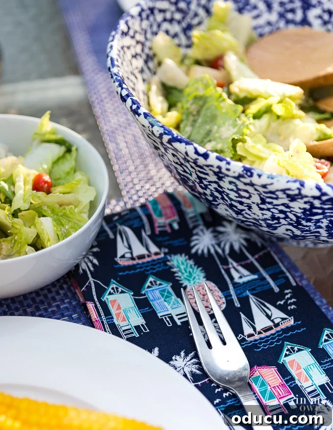 The Ultimate Anchovy-Free Caesar Salad 2 Caesar Salad recipe in blue and white bowl on table