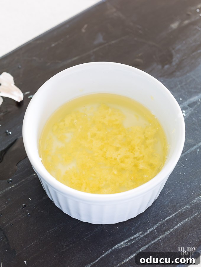 The Ultimate Anchovy-Free Caesar Salad 5 Minced garlic in a cup of oil.