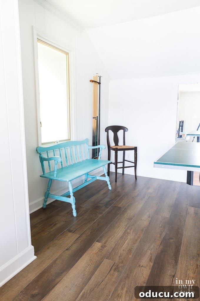 Game room with pool table and existing seating on new LVP