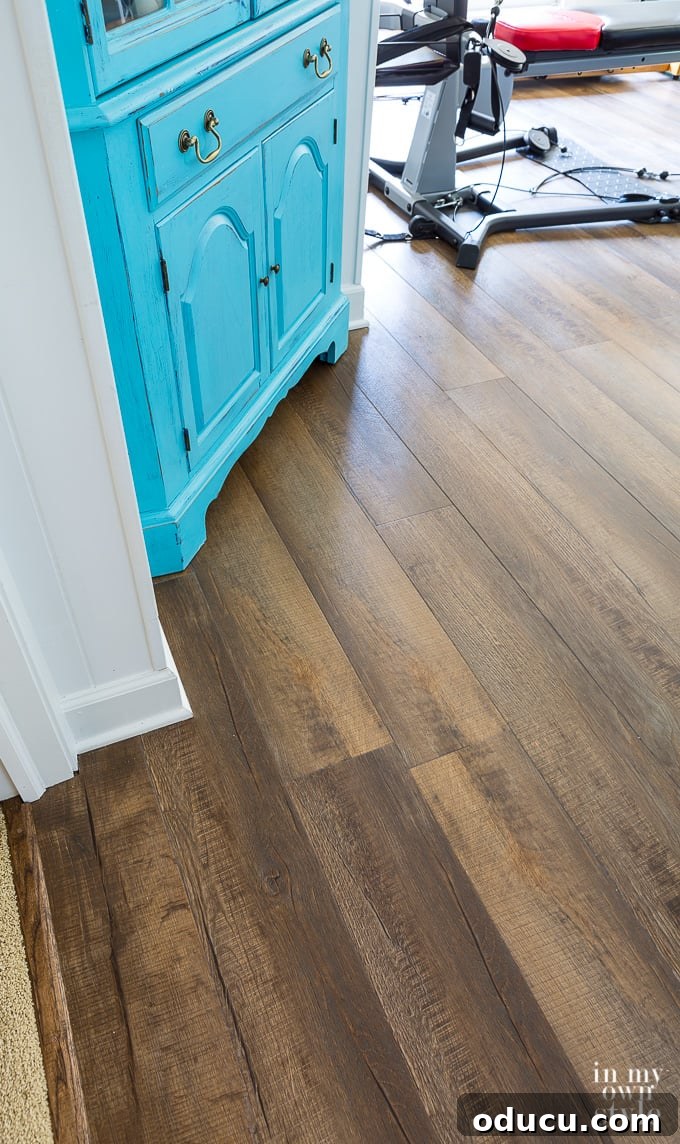 Tarkett ProGen Milled Oak Copper LVP planks ready for installation