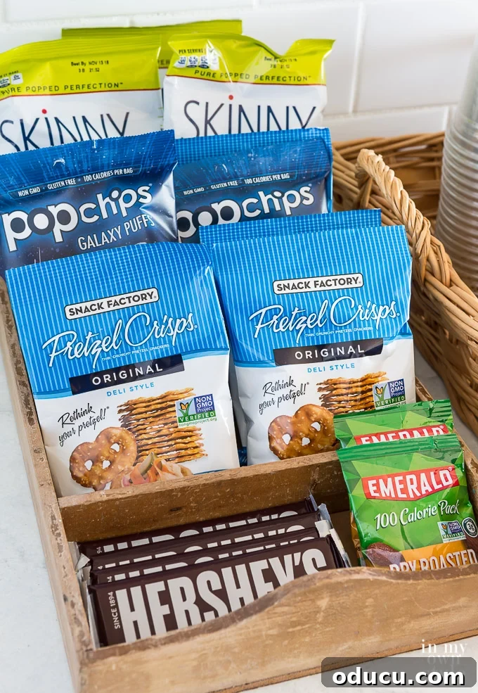 Kitchen Snacks ideas and entertaining tips for overnight guests. #entertaining #guestroom #kitchen #overnight #food #snackideas Kitchen counter with various snacks and food items, demonstrating entertaining tips for overnight guests