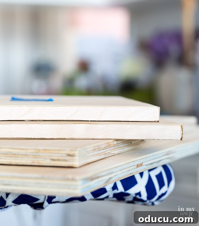Build a Stunning Stacked Donut Wedding Centerpiece 18 Top two pieces of plywood have iron-on wood veneer on them. The bottom two boards still have the raw edge.