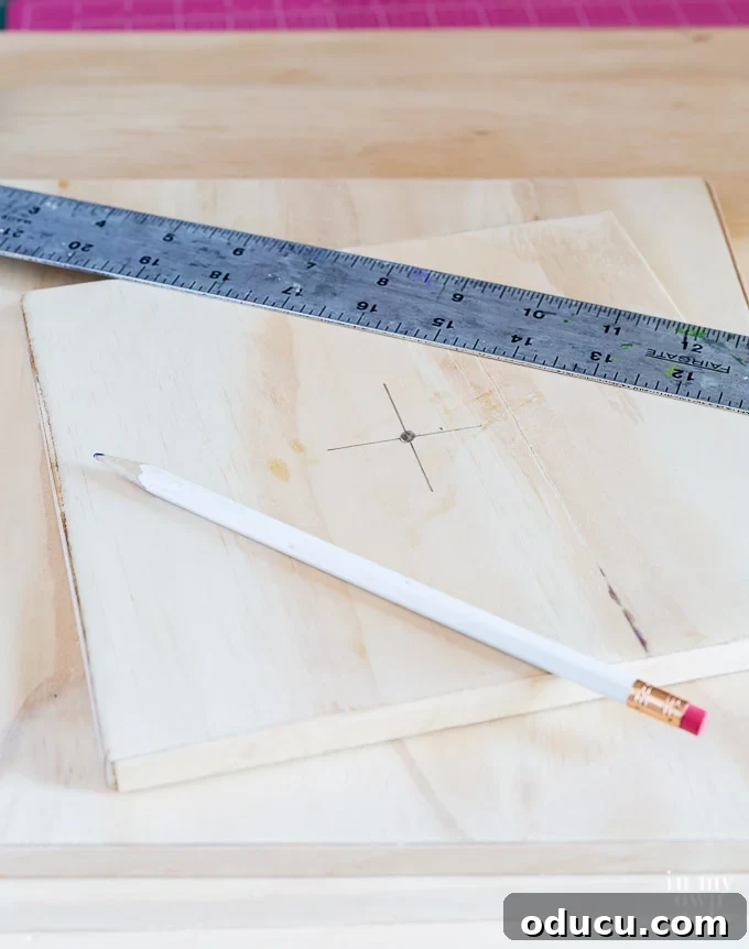Build a Stunning Stacked Donut Wedding Centerpiece 21 Drilling guide for center of plywood boards