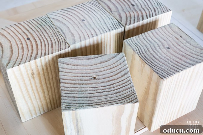 Build a Stunning Stacked Donut Wedding Centerpiece 23 Drilling pilot hole into the center of a riser block