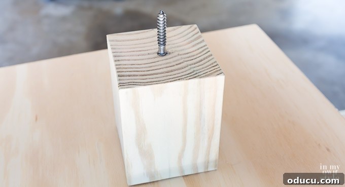 Build a Stunning Stacked Donut Wedding Centerpiece 32 Dowel screw securely installed in a riser block