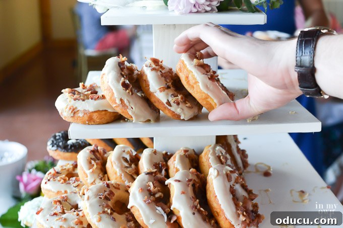 Build a Stunning Stacked Donut Wedding Centerpiece 10 How to make a tiered donut wedding cake stand with various items