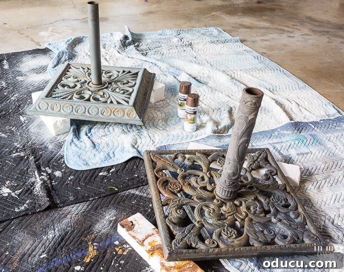 painting metal outdoor furniture techniques Two outdoor patio umbrella stands waiting for a spray paint makeover