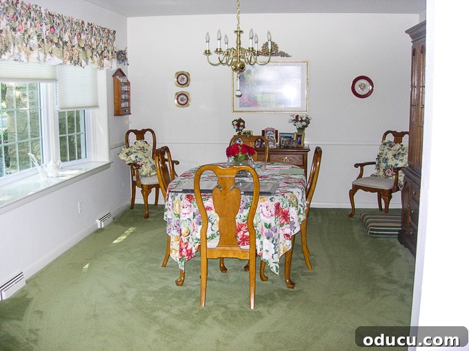 Carol's dining room before the makeover, featuring traditional furniture and decor that needed updating.