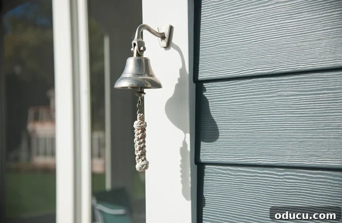 Hardie Plank lap siding with a cedar wood texture Silver bell on house with Hardie plank siding, showcasing texture