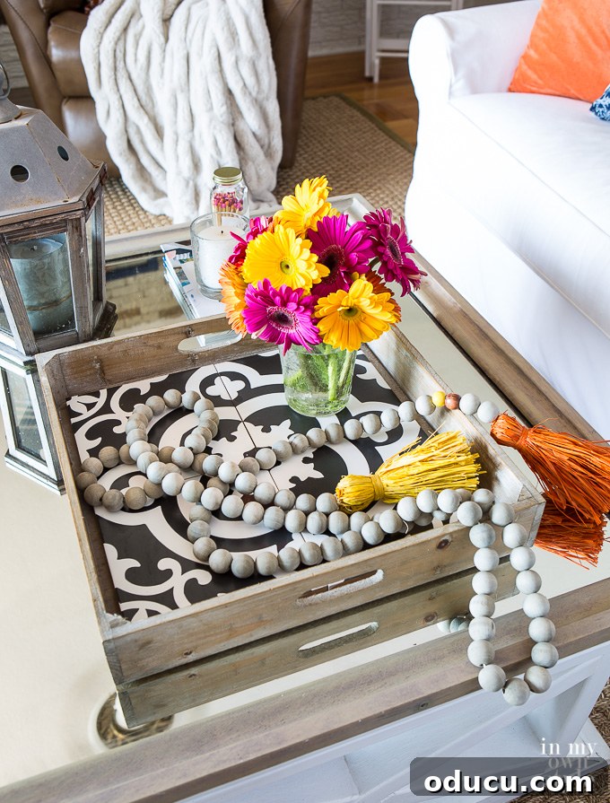 Decorating ideas for fall using decorative black and white tiles on a tray Plain wood tray instantly transformed with four decorative black and white patterned tiles