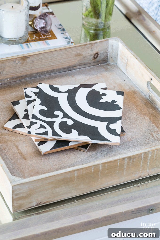 How to effortlessly transform a plain wood coffee table tray with tiles Animated gif showing the easy process of placing decorative tiles into a wood tray