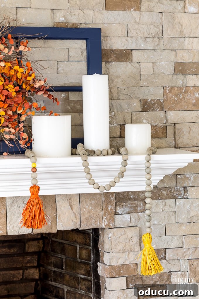 Effortless Fall Comfort: Cozy Decorating Ideas for Your Home 13 Fall mantel decorated with candles and natural elements