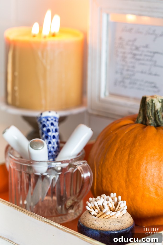 Effortless Fall Comfort: Cozy Decorating Ideas for Your Home 14 Fall candle in a kitchen setting