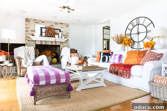 Effortless Fall Comfort: Cozy Decorating Ideas for Your Home 5 Plum pillow on a sofa, tying in surprise fall color