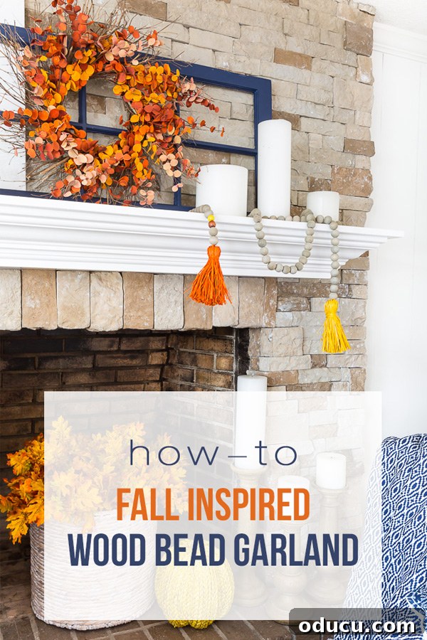 Fall Decorated Fireplace with DIY Wood Bead Garland and Autumn Accents A charming fall-decorated fireplace and mantel, featuring a handcrafted wood bead garland with autumnal tones and textures.