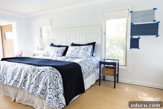 Blue and white bedroom waiting for new flooring Blue and white bedroom before