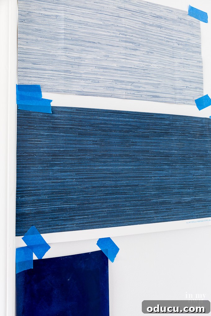2 colors of Faux Grasscloth wallpaper swatches on wall 2 colors of Faux Grasscloth wallpaper swatches on wall