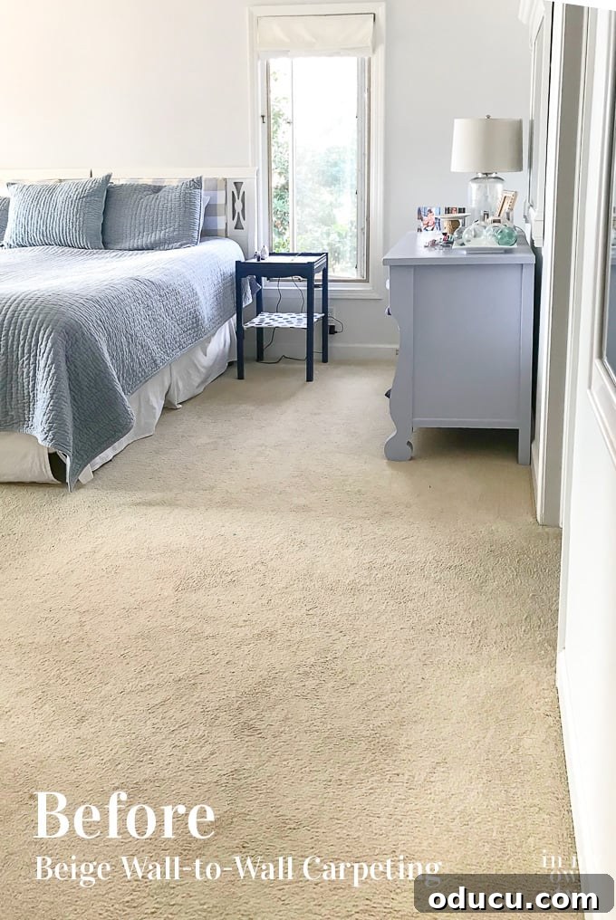 Before and After Bedroom Flooring makeover Bedroom before adding laminate wood flooring, showing old carpet.